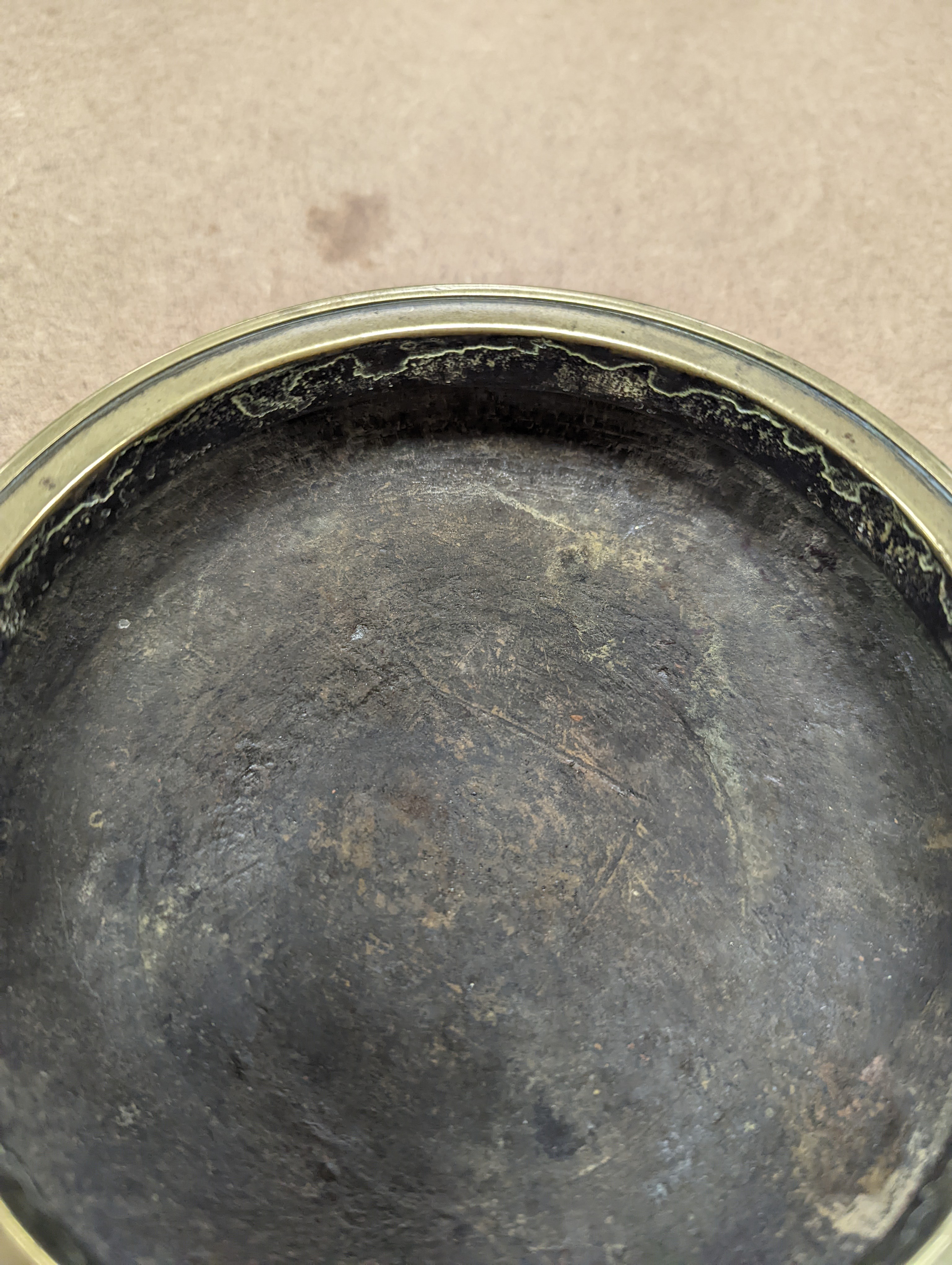 A Chinese bronze censer, ding, Xuande mark, 18th / 19th century, diameter 16.6cm, height 6.7cm